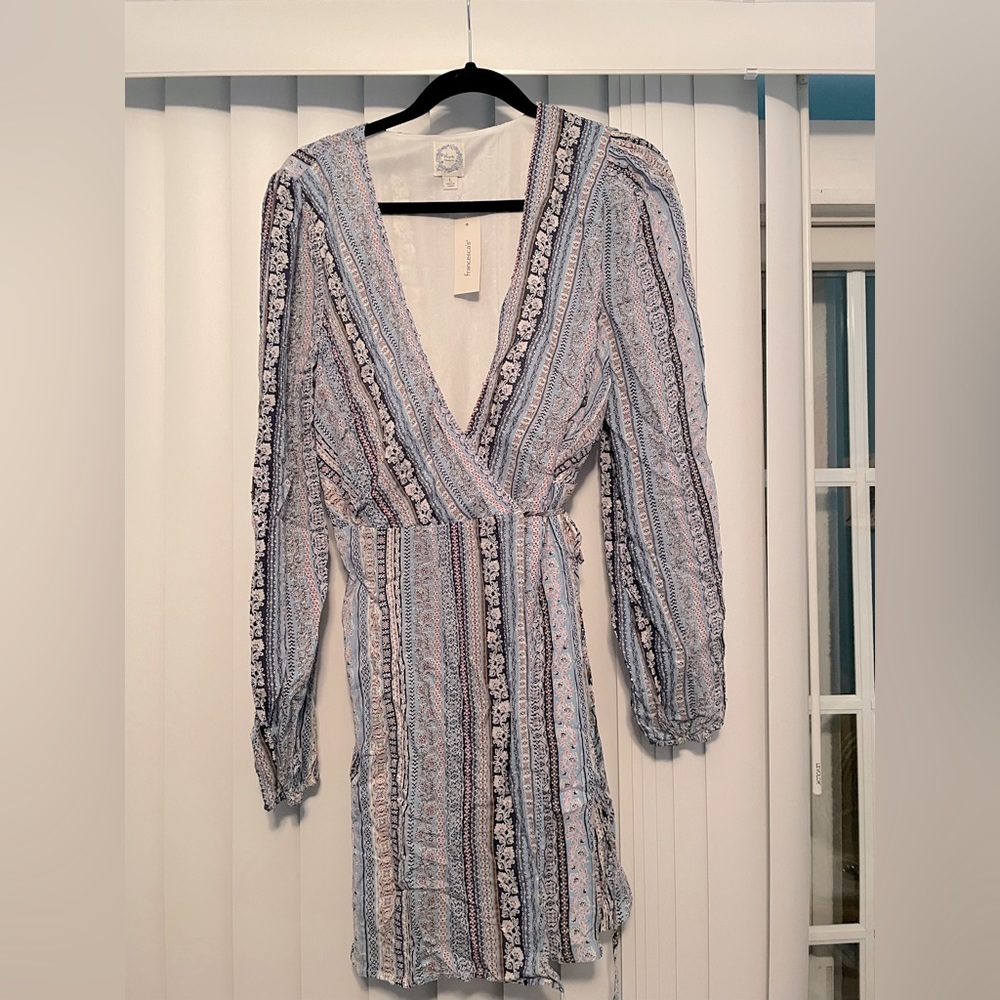 NWT Francesca’s long sleeved wrap dress.